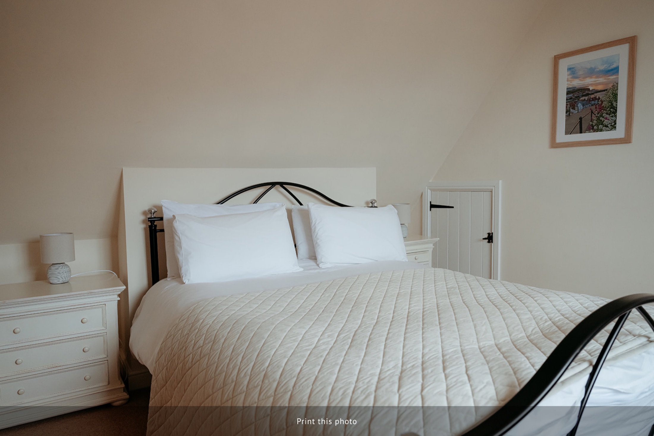King bedroom with cream bedding