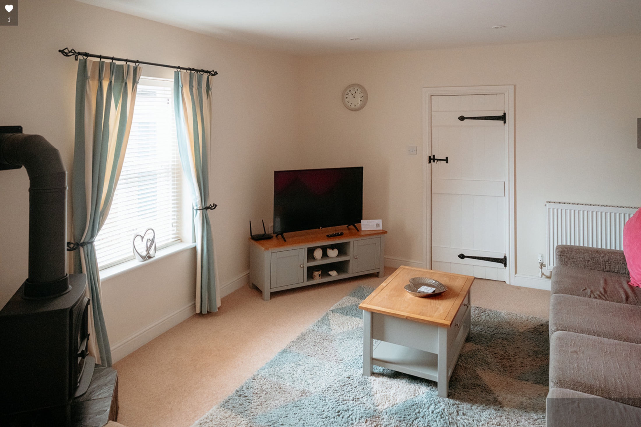 Living room with television and dining table