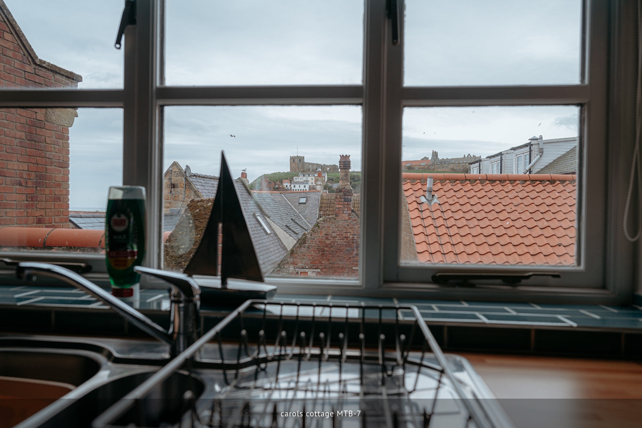 View over Whitby rooftops from a window
